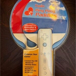 The Sak Red and Blue Twin Ping Pong Paddles with White Wii-Style Controller